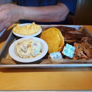 pulled pork, ribs, mac &amp; cheese and potato salad
