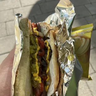 Seattle dog with cream cheese and relish and mustard and ketchup