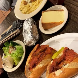 Chicken Parmigiana sandwich, Fettuccine Alfredo with Chicken Breast with Caesar Salad. And, cheesecake for dessert.