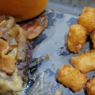 Hot mess burger with tots.