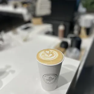 a cup of coffee on a counter