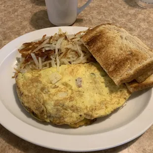 Denver omelette with hash browns and sourdough toast.