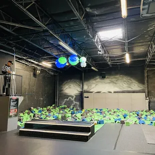 Trapeze and foam pit