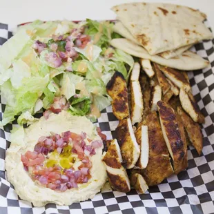 Grilled chicken, hummus, pita bread,salad