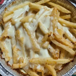 Fries with mozzarella cheese delivered through the location