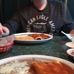 I had 2 enchiladas and he had an enchilada and burrito