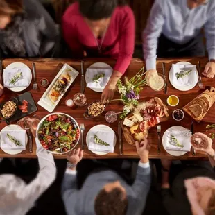 Diners are encouraged to share creative small plates in a vibrant, industrial chic setting.