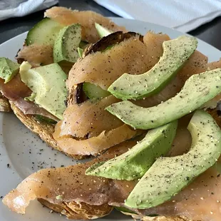 Avocado lox toast. Very good and loved the cucumber on it. Menu didn't have prices so unsure but large portion - 4 large slices.