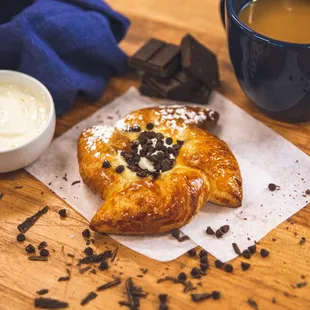 a pastry and a cup of coffee