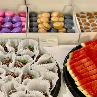 a variety of desserts displayed on a table