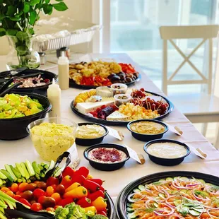 a table full of different types of food