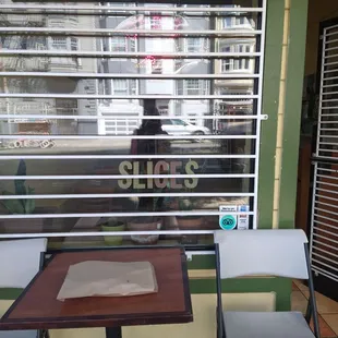 a view of the outside of a restaurant