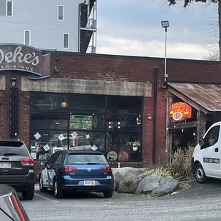 cars parked in front of the restaurant