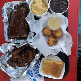 Full Baby Backs, BBQ Chicken (5) Wings, lShells &amp; LG Shells &amp; Cheese, Fried Mac and Cheese, BBQ Beans, Cornbread