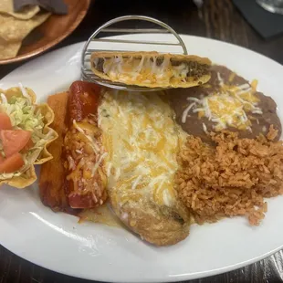 Combination plate tamale, cheese enchilada, chili Relleno, taco rice and beans. The chili relleno was fantastic.