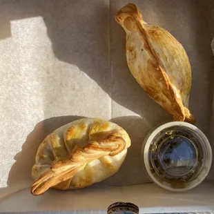 Chicken Empanada caprese empanada with pesto sauce