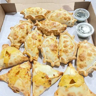 Shrimp and meat lovers empanadas with 2 oz. Chimichurri - this is delicious food made with love in every bite!