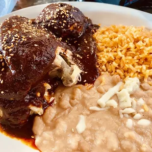 Mole with rice and refried beans
