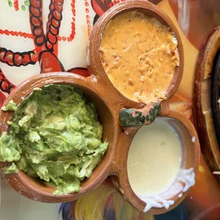 Chorizo cheese dip , guacamole and cheese it was supposed to be beans but they replaced with cheese since I don&apos;t do beans lol