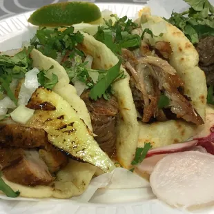 They pile the meat up on these homemade tortillas. $2 each. Look at that huge strip of pineapple on the pastor!