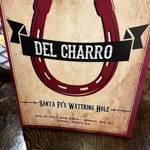 a sign for santa fe&apos;s watering hole