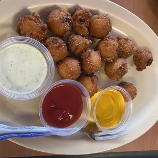 Hush Puppies (served with ketchup, tartar sauce, and melted butter)