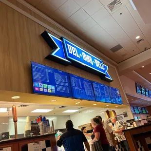 people ordering food at a del mar deli