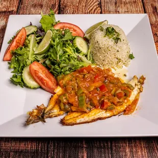 Butterfly branzino fish with olives, capers in a mild sauce.