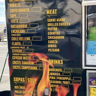 a menu on a food truck