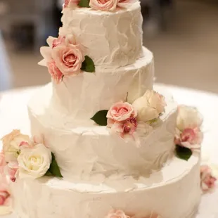 Our wedding cake. Lucy delivered, we bought the flowers, and she made it beautiful! Photo by Brooks Whittington
