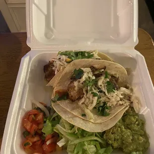 Quail tacos. Big quail breast with a pepper inside for extra kick. Brought it home so I could devour it in peace.