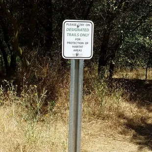 Lots of these warning signs.  Stay on the trail!