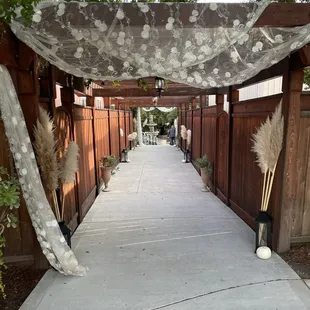 Guest walkway/entrance from parking lot into the ceremony space. Wedding 10/21/23