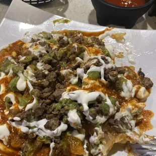 Asada fries. Rancid taste. Smell was strongly foul.