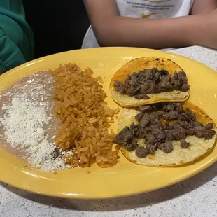 Kids plate. Nasty beans with bad aftertaste. Meat smelled and tasted old as well.