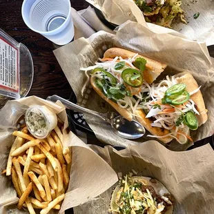 The spread :) BBQ Pork tacos, Bulgogi banh mi and fries