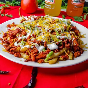 a plate of chili cheese fries