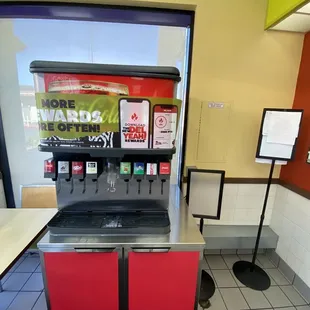 a counter with a beverage dispenser