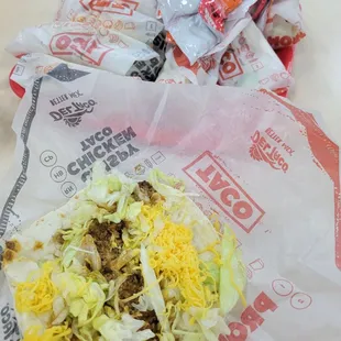 a taco and chips on a table