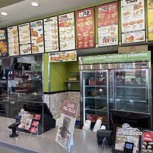 menus on the wall of a restaurant