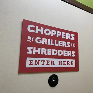a sign on the wall of a restaurant