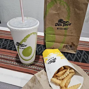 Large fries and medium cherry coke