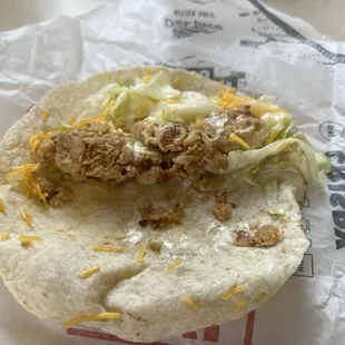 Chicken taco, extra cheese and no sauce requested  Ended up with almost no cheese and it still had sauce.