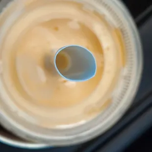 Orange cream shake with giant straw