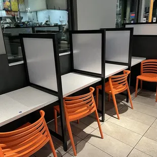 Strange reminders of the detention desks we had in middle school.