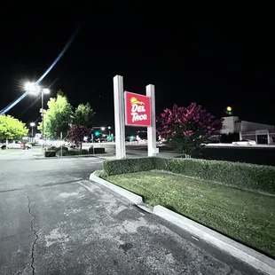 an empty parking lot at night