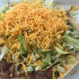 Tostada: delicious beans and a HUGE portion of them! Best item for taste and value on the menu! Add hot sauce for zing.