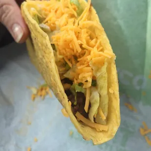 Crunchy Taco: light and crispy shell (lighter than TBell). Interior meat tastes like canned tamale filling.