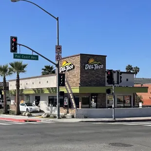 the corner of a street with a traffic light