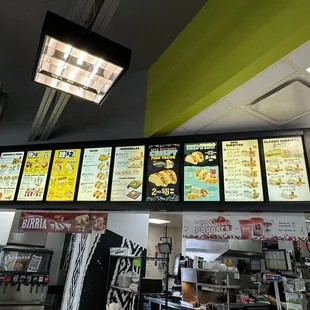 menus on the wall of a restaurant